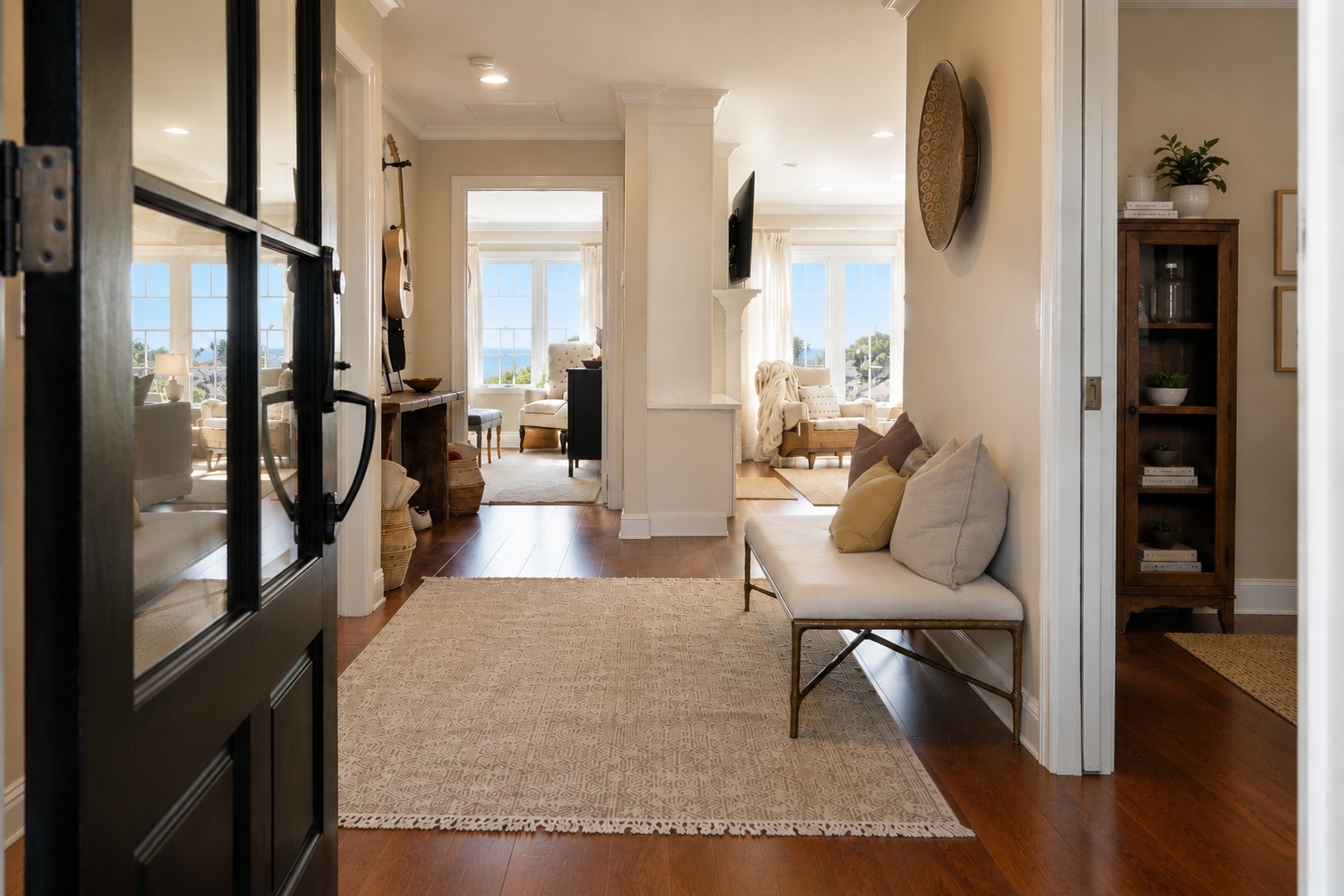 Entry foyer looking into living room with ocean view