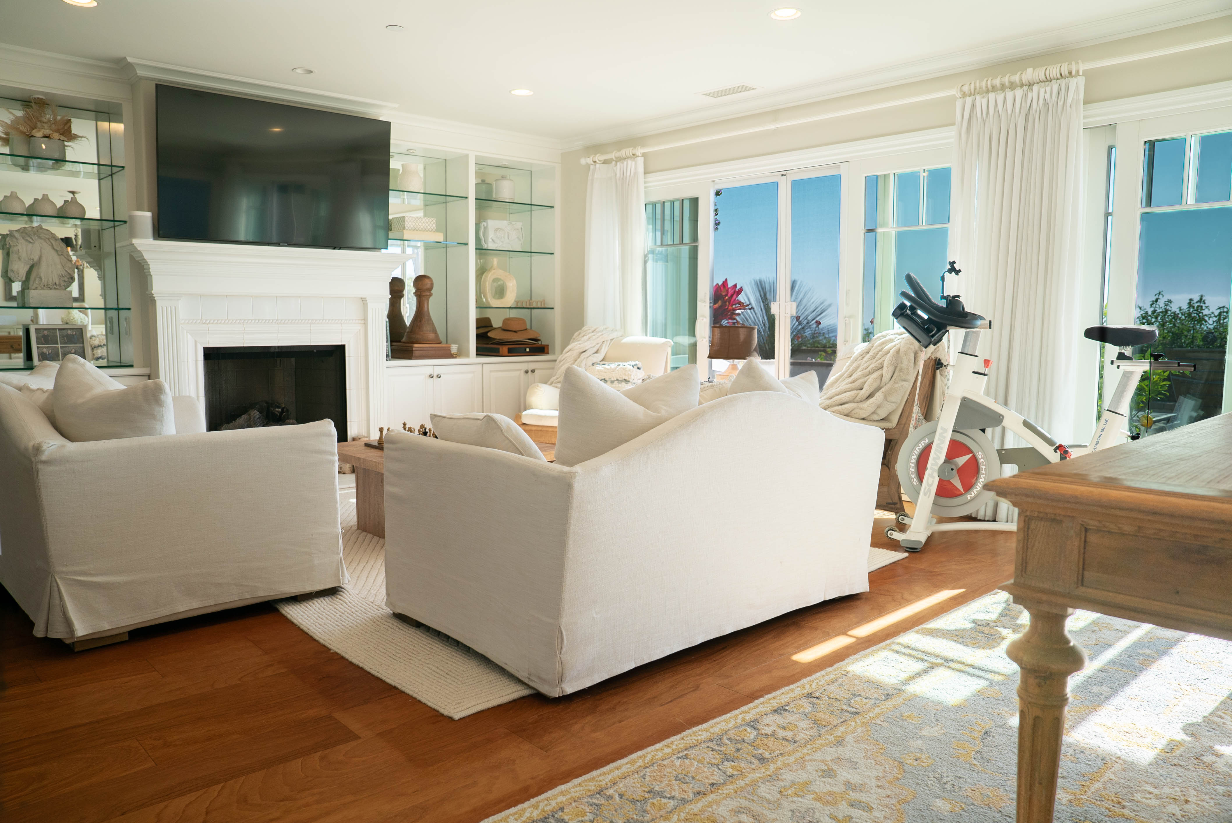 Living room listing photo with ocean view